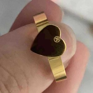 Extravagante 2021 alto pulido Simple corazón amor banda anillo oro plata rosa colores acero pareja anillos moda mujer diseñador