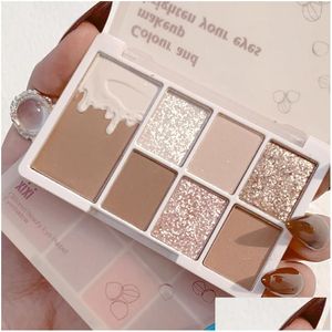 Fard à paupières 7 couleurs Glitter Palette de fard à paupières Shimmer Facile à porter des ombres Palette de maquillage pour les yeux Femmes Cosmétiques Drop Delivery Dhn4U