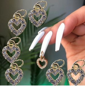 Delinador de ojos 100pcs Nail Dangle Diamond Heart Jewelry 3d Hanging Nail Stone Charms Love Heart Metal Nail Art Jewel Charms (100pcs/Bag)