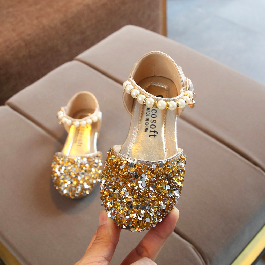 gold baby slippers