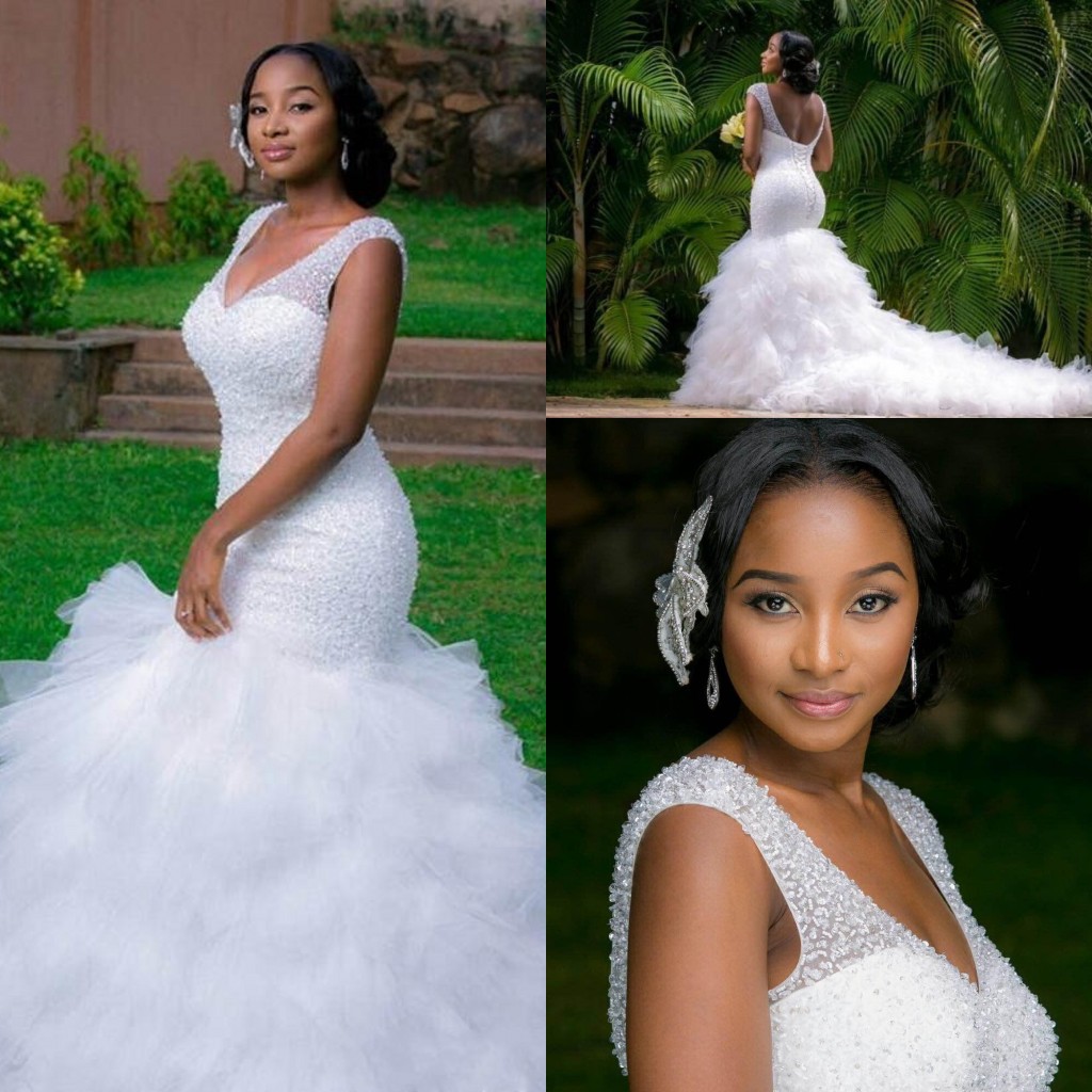 

African Plus Size Mermaid Wedding Dresses 2019 Cheap V Neck Bling Beaded Tiered Ruffles Wedding Gowns Chapel Train Open Back Bridal Dress, White