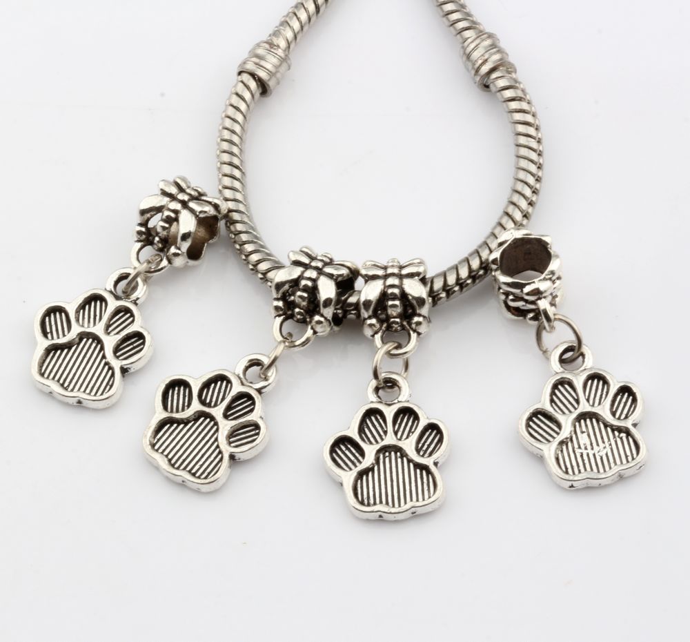 50 silver tone hollow baby footprint charms pendants for necklaces bracelets