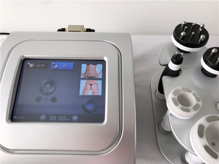 

new portable rf + vaccum 2 in 1 rf skin tightening machine for professional fat removal and body slimming/ RF vacuum weight loss machine