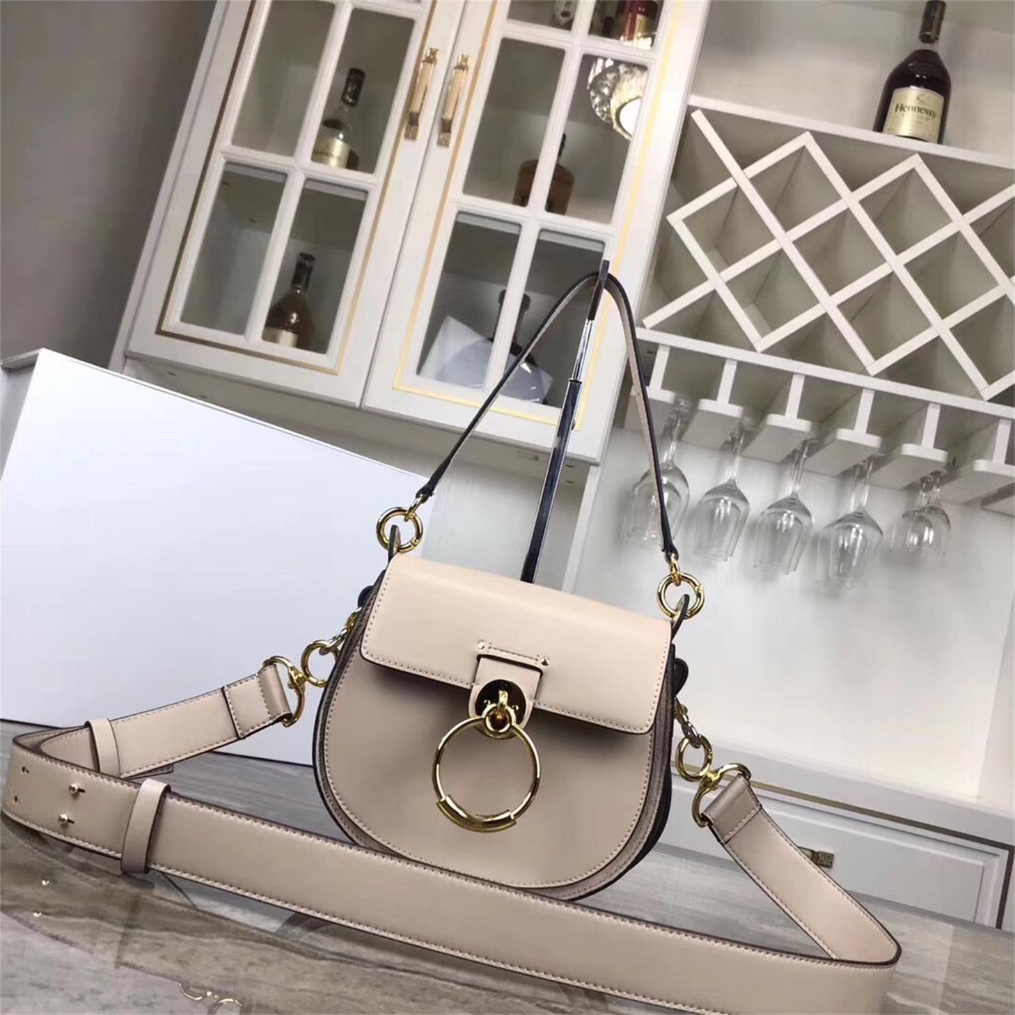 

Designer- latest autumn and winter stars, wild color matching, ring saddle bag, matte top layer cowhide, explosion model pig shoulder bag, Beige