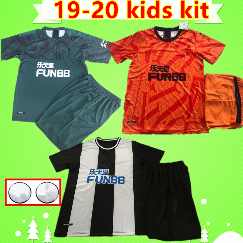 camisetas de futbol naranjas y negras