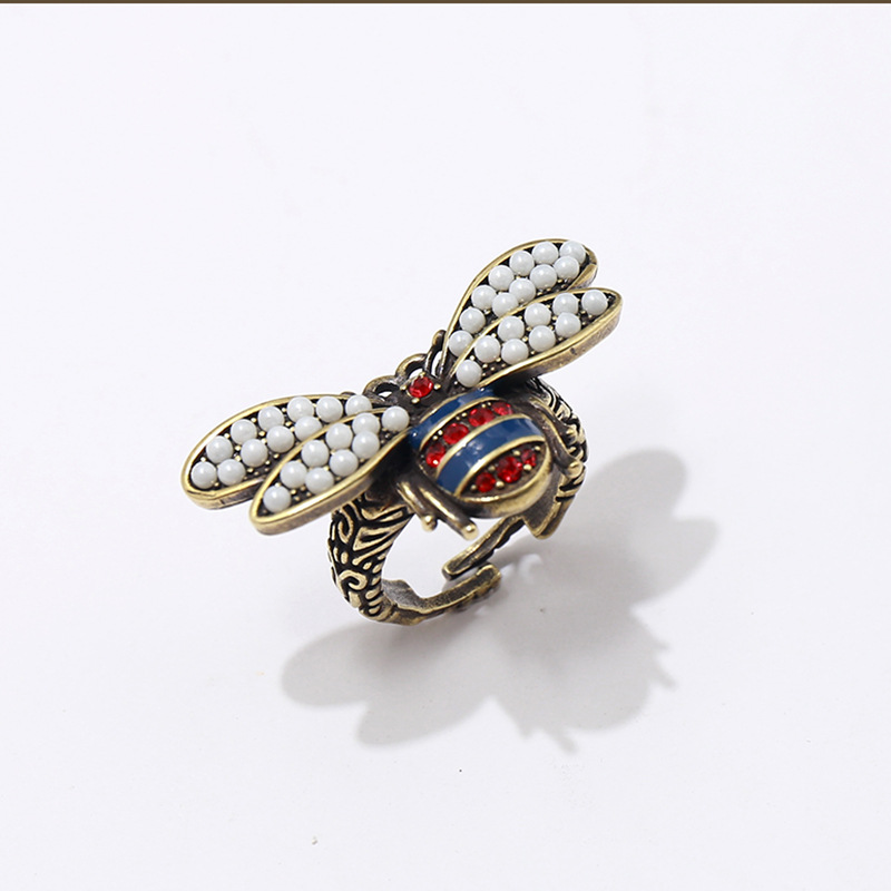 

Fashion jewelry Copper retro pearl double-winged bee red and blue diamond ringRing for woman