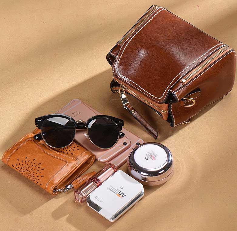 Designer-New Korean version of genuine cowhide retro Baitao oblique Bag bucket bag ladies fashionable one-shoulder handbag