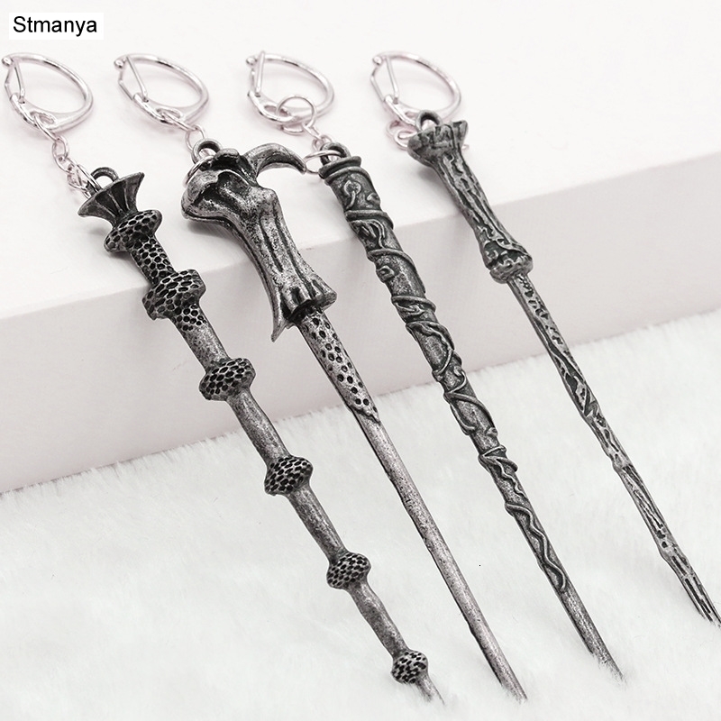 

Fashion New Men Key Chain Car Women Car Metal Keychain Bag Charm Accessories Key Ring Magic Stick New Key Holder