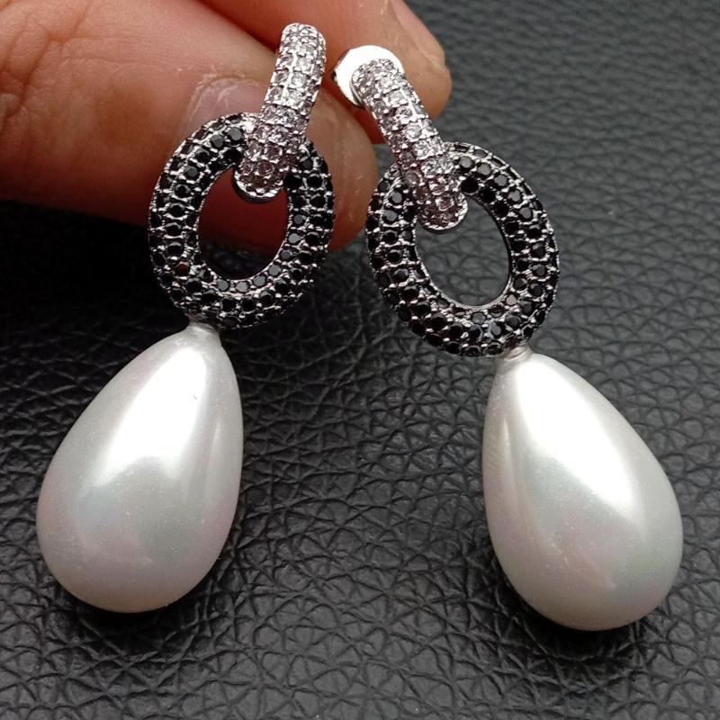 

Hoop & Huggie Teardrop White Sea Shell Pearl Cz Pave Stud Earrings