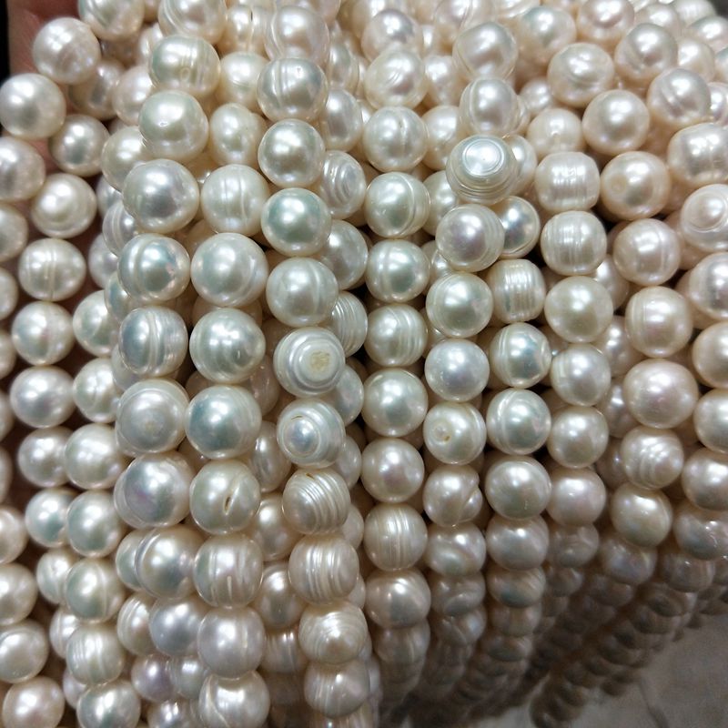 

10mm white loose cultured freshwater pearl strands potato shape with ridges