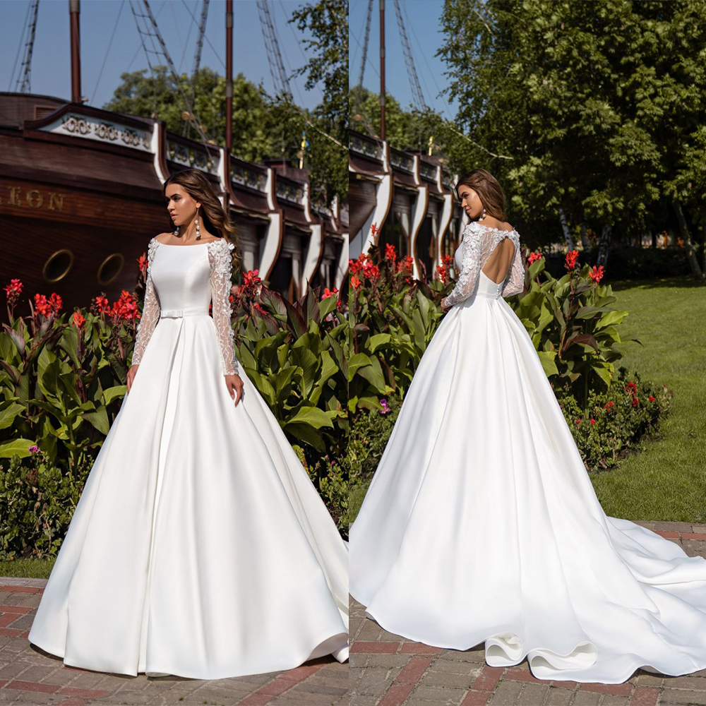 

2020 Bohemian Bridal Dresses Bateau Neck Appliqued Long Sleeves Wedding Dress Open Back Bow Sash Sweep Train Custom Made Robes De Mariée, Nude