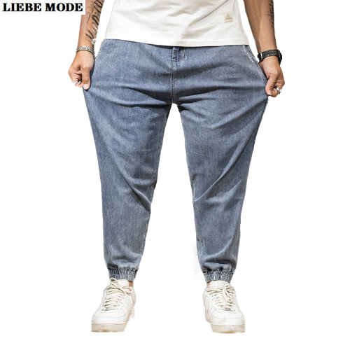

Mens Streetwear Designer Stretch Jeans Plus Size Loose Fit Denim Jeans for Men Vintage Elastic Waist Oversized Pants Black Blue