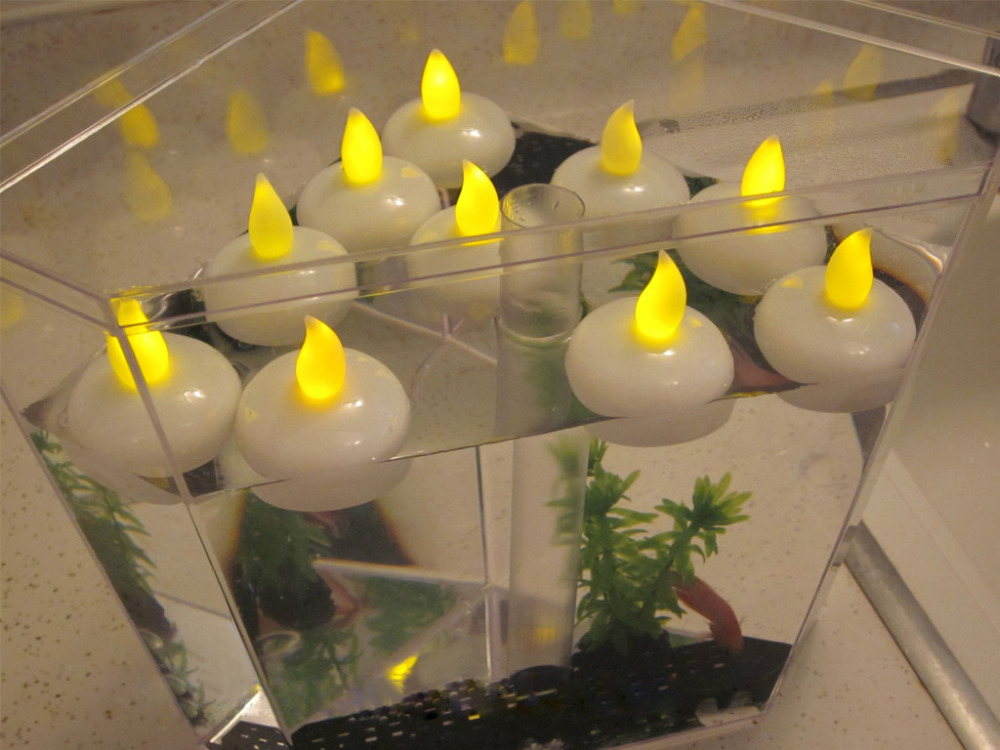 

SXI 12pcs/lot Wholesale LED Flameless Flickering LED Tea lights,Waterproof Floating LED Tealight Battery Powered Waterproof Floating candle