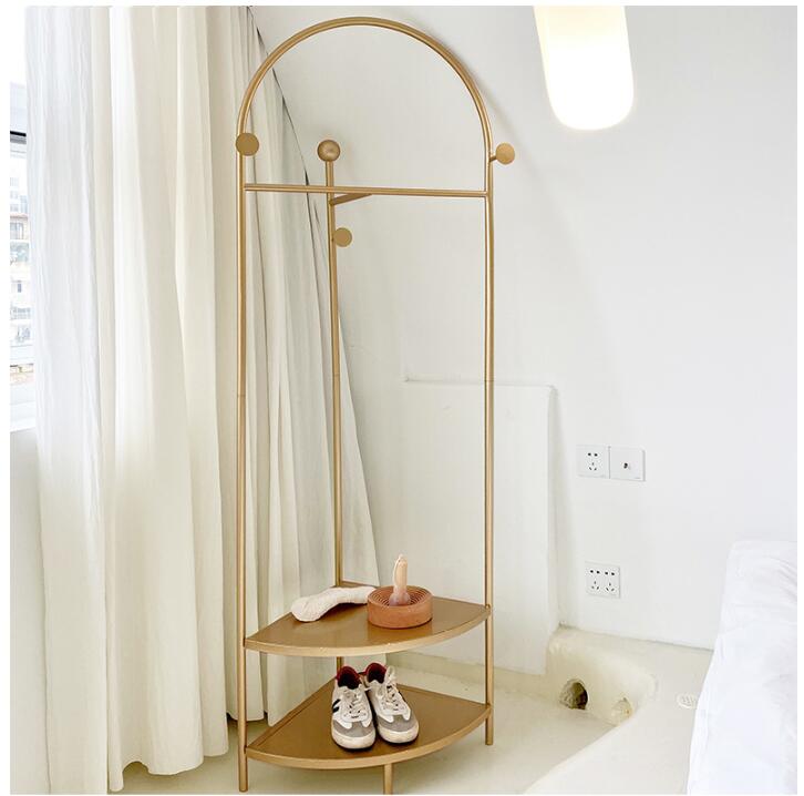 Clothing on the floor racks corner bedroom Furniture hangers corners northern Europe rack-image-538962636