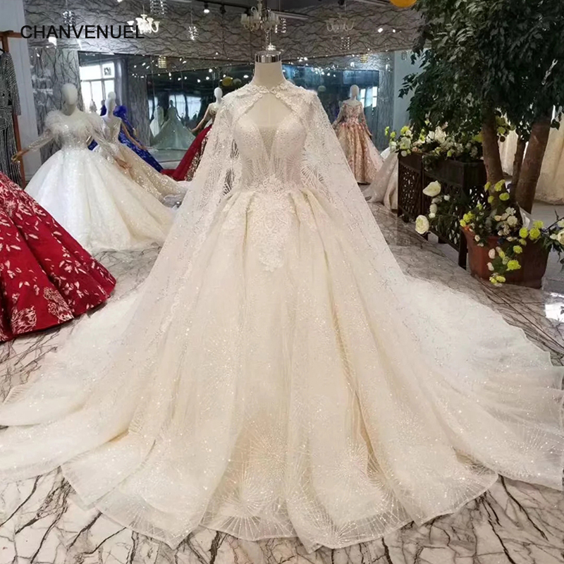 ball gown wedding dress with cape
