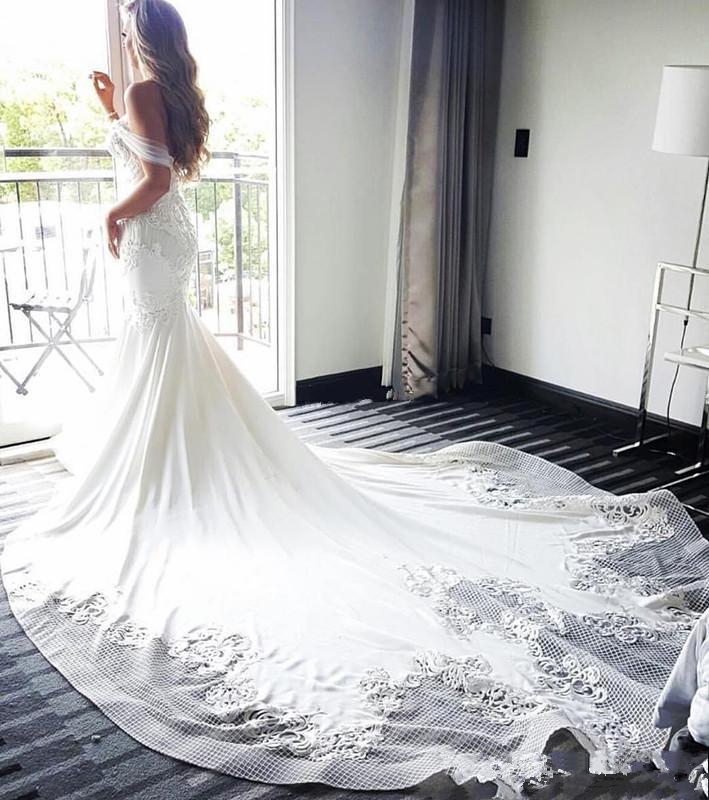 Fabulous Off The Shoulder Sexy Mermaid Wedding Dresses 3D Lace Appliqued Backless Bridal Gown Long Chapel Train Vestidos De Novia