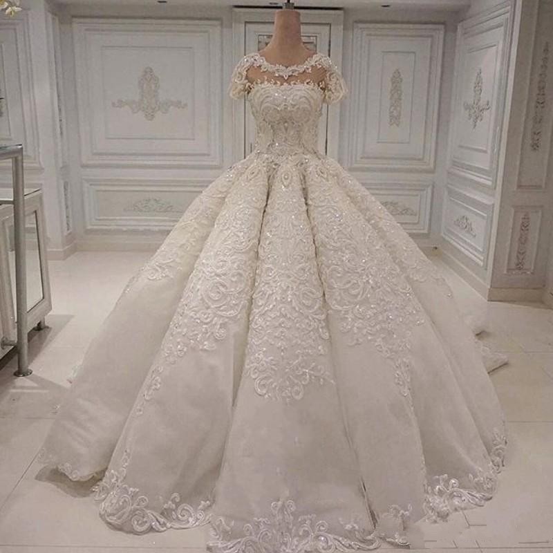 

Luxury Wedding Dresses Elegant Gorgeous African Ball Gown Lace Appliques Crystal Beads Short Sleeves Bridal Gowns Vestido de novia, White