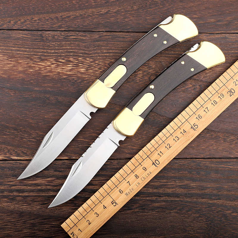 

High-end Bk 110 double action knife single action back to serrated brass + wooden handle hunting New Year gift knife 1 piece