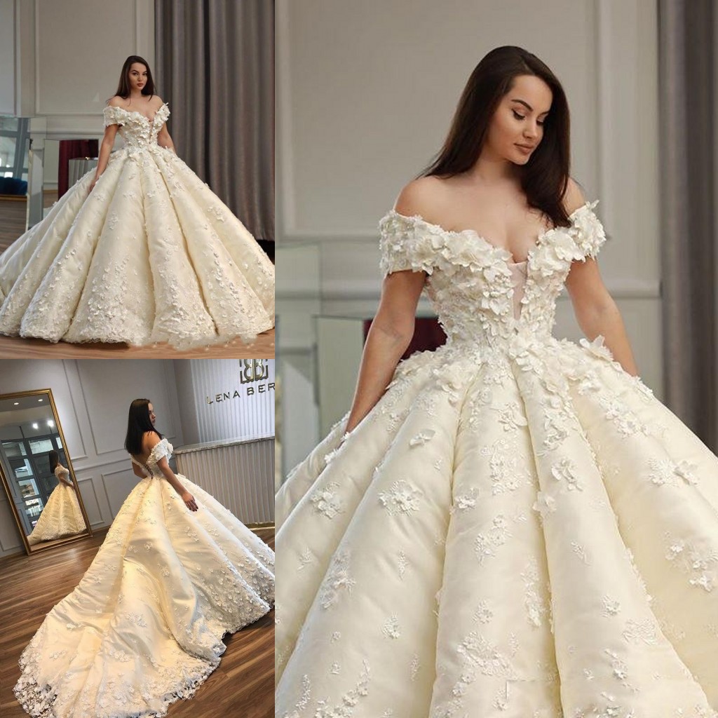 

2020 Glitz 3D-Floral Appliques Flower Ball Gown Wedding Dresses Off-the-Shoulder Ruffle Sheer Neck Lace-Up Bridal Gown BC1090, White