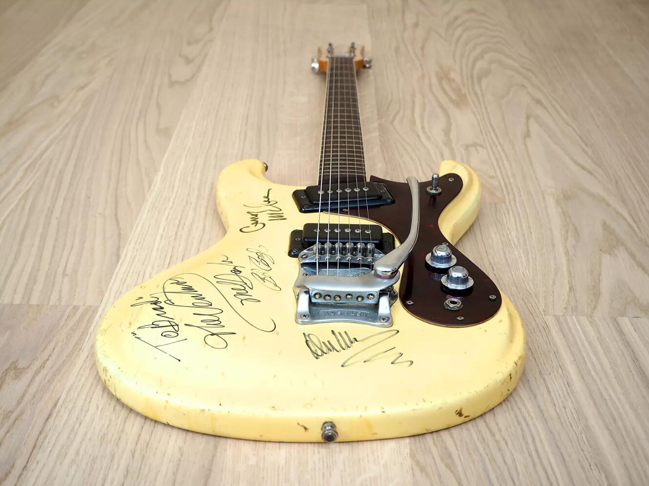 

Rare 1965 Mosrite Ventures Signed Vintage Cream Relic White Electric Guitar, Bigs Tailpiece, Black P 90 Pickups, Red Brown Turtle Pickguard