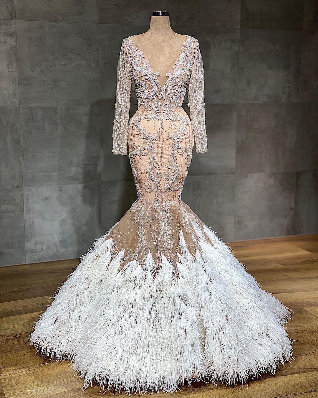 2020 Arabic Aso Ebi Stylish Mermaid Prom Dresses Lace Appliqued Beaded Feather Evening Dresses Long Sleeves Vintage Formal Robe De Soiree