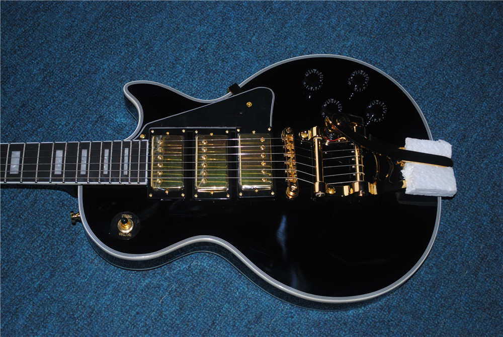 free delivery! Wholesale high quality LP custom shop black electric guitar rosewood finger. Golden hardware, golden jazz 3 pickup