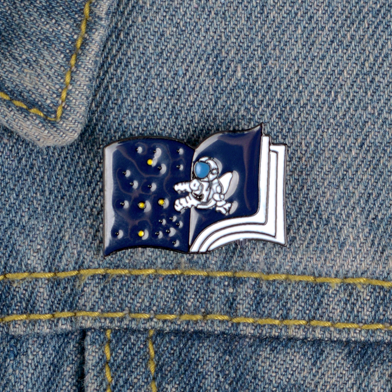 

Magic SpaceTtravel Book Enamel Brooch And Pin Universe Cosmonauts Astronaut Enamel Brooches Lapel Pins For Amateur Astronomer