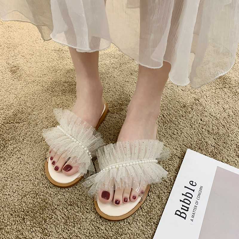 

Net red sandals and slippers women wear fashion 2020 new summer wild lace vacation open toe flat bottom drag, Beige