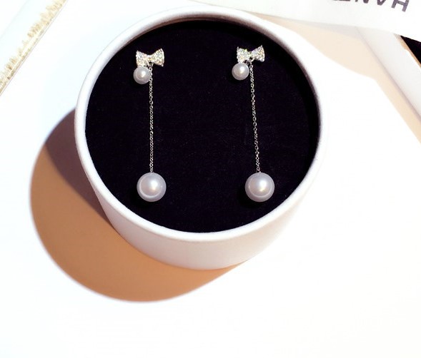 

Wholesale-s fashion designer luxury super glittering rhinestone cute bow long dangle chandelier silver stud earrings for woman girls