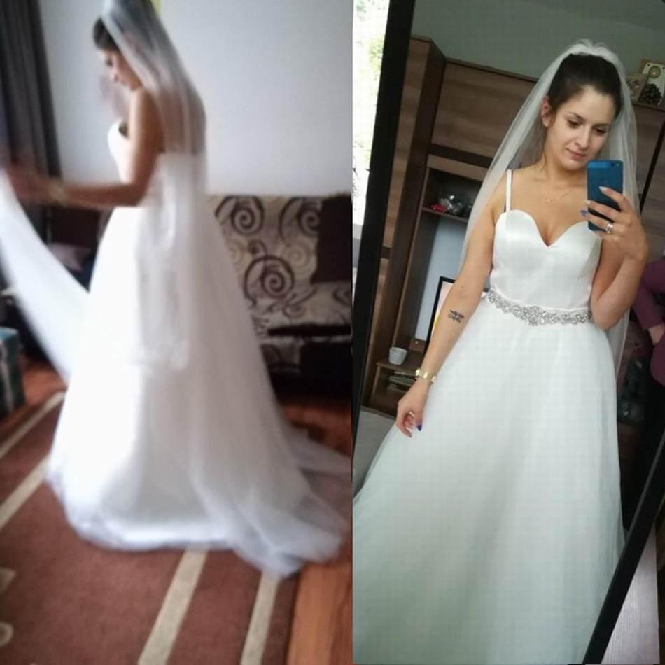 

2019 A-Line Spaghetti Strap Beach Wedding Dresses With Beaded Sash White Ivory Tulle Backless Wedding Bridal Gowns 83