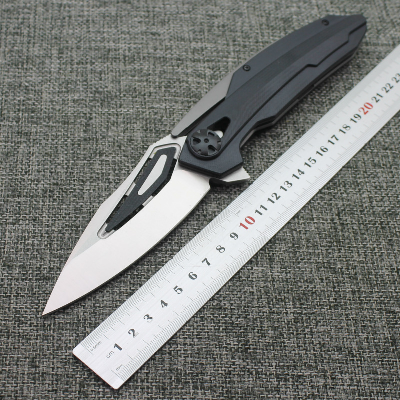 

Christmas gift knife 9cr18mov steel 0999 ball bearing G10 handle turning folding knifeStyle innovative Fine knivesFree Shipping