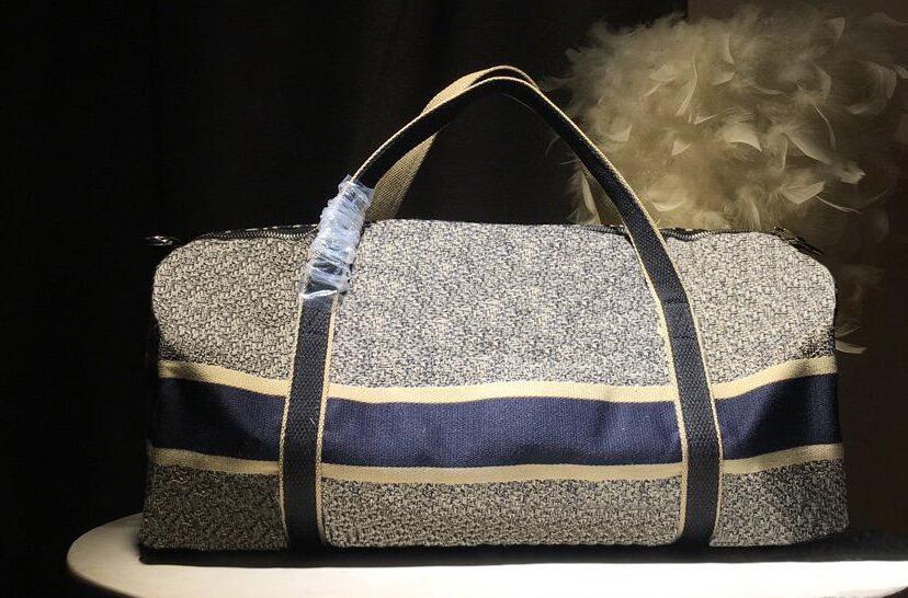 Designer sac à main de luxe de grande capacité des femmes sacs de voyage 2020 hommes vente de qualité sacs polochons épaule portent sur le fond d