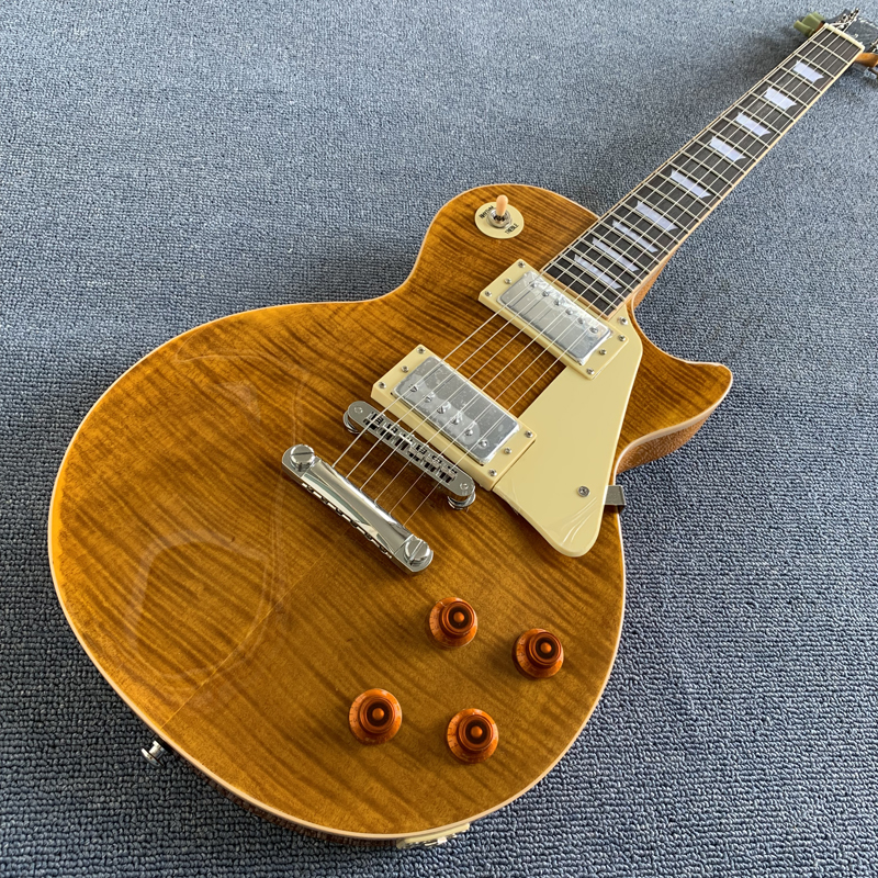 

Custom shop Guitar lp Mahogany body Brown burst Tiger Flame top,fret edge binding,one piece body & neck.tone-pro bridge180308