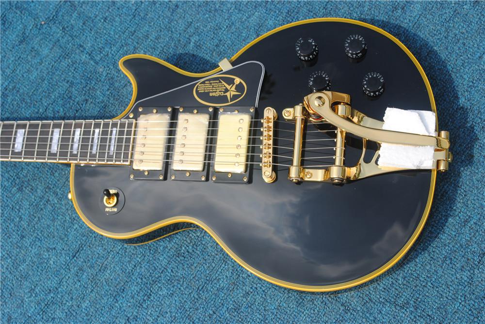 3 Pickups Custom Shop Electric guitar,Solid Mahogany body With Black paint and yellow binding,Golden Hardware,free shipping!