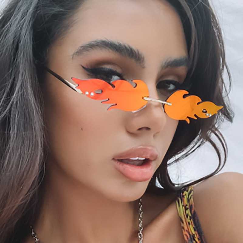 

Hot Sale popular flame sunglasses European and American fashion trend glasses men and women metal frameless sunglasses glasses