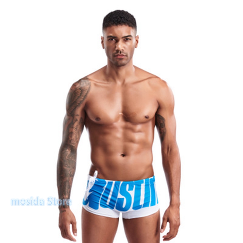 

100pcs Men's four-angle swimming trunks boxer swimming trunks men's large letter beach