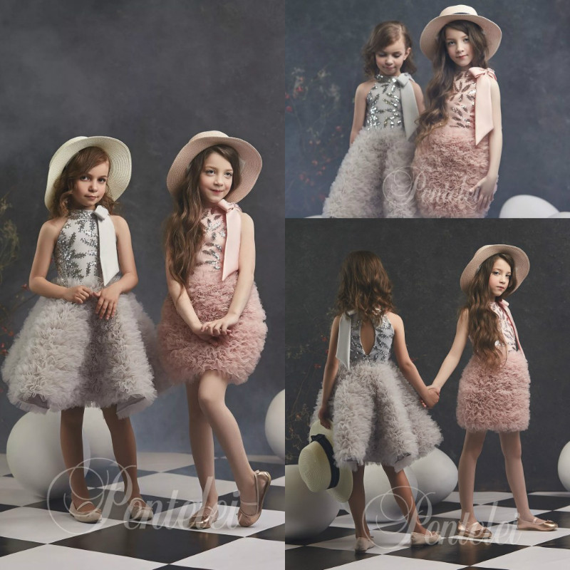 

Dreamly A Line Flower Girl Dress Halter Sleeveless Hollow Bow Sequins Ruffles Tulle Tiered Pageant Dress Knee Length Girl's Birthday Part, White