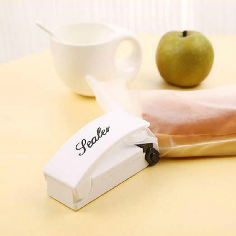 

New 209 Mini Handle Bag Sealer Electronic Home Heat Sealing Machine Vacuum Impulse Sealer Seal Packing Plastic Bag Clips Kitchen Tools