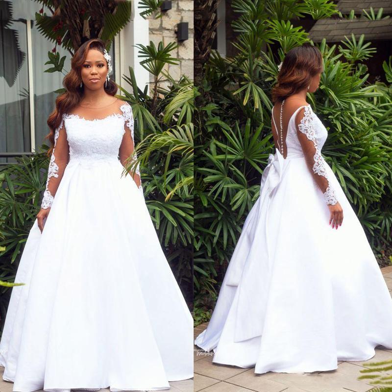 Setwell Jewel Sheer cou A-ligne Robes de mariée manches longues sexy dos nu dentelle appliques longueur de plancher Robes de mariée