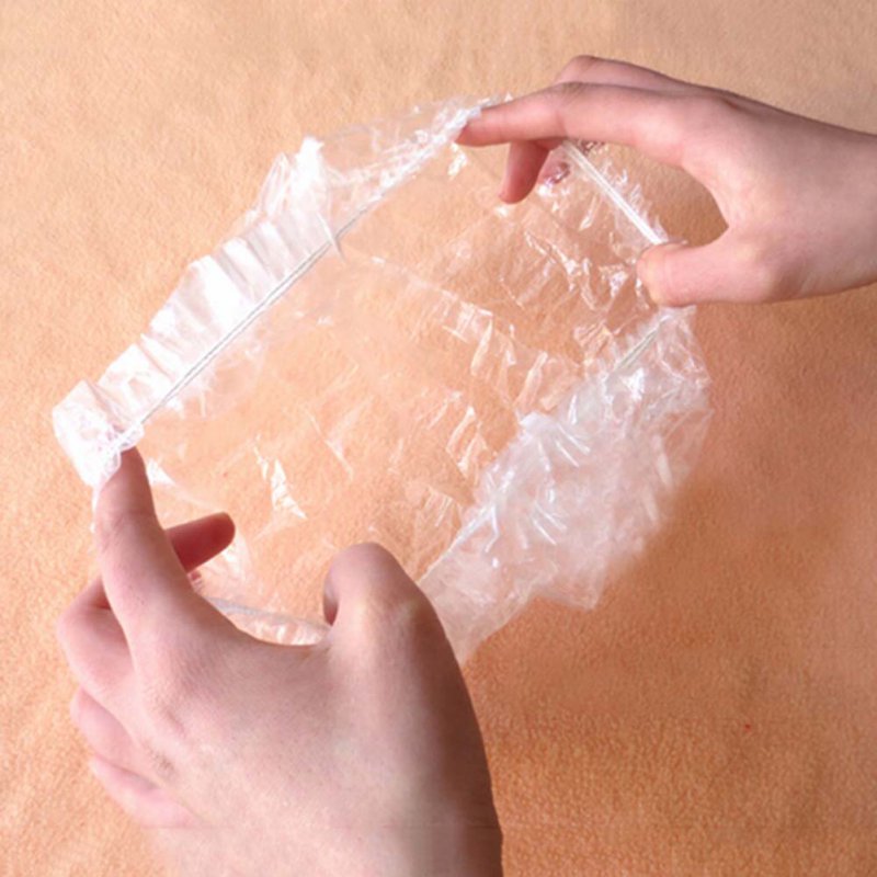

100pcs/Lot Hair Salon Disposable Clear Home Shower Bathing transparent shower cap, portable shower cap