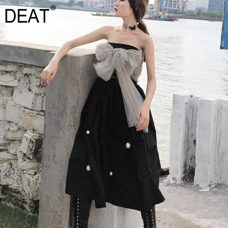 

DEAT Solid Color Pearl Pleated Irregular High Waist Loose Plus Woman Skirt Simple Temperament Fashion 2020 spring New TV042, Black