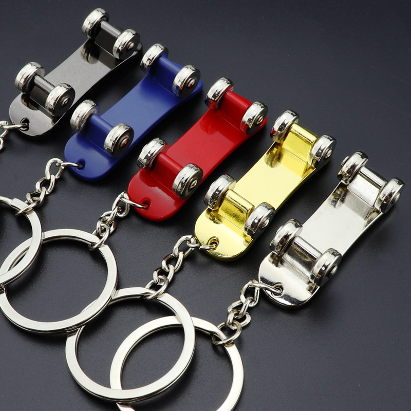 

Rotatable Skateboard keychain metal keyrings skateboard pendant handbag hangs key holders fashion jewelry will and sandy gift