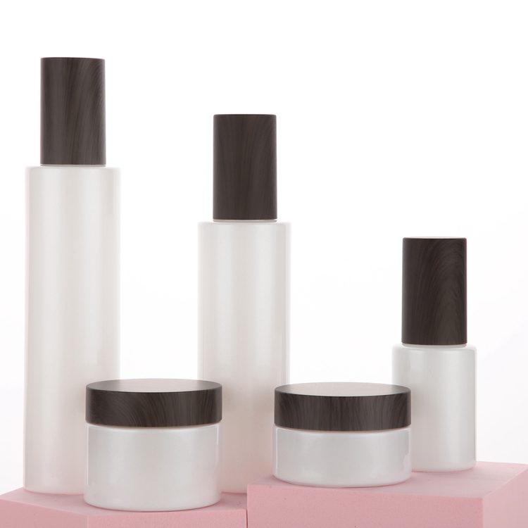 

Wholesale 1oz glass pearl white serum pump bottle, empty glass lotion bottle with black wooden plastic cap