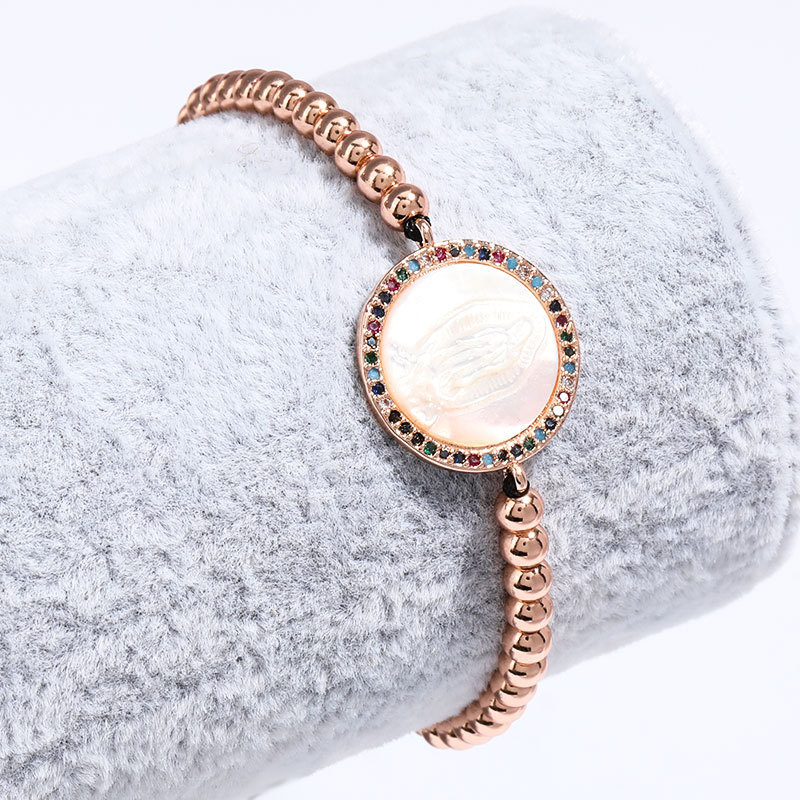 

Copper plated real gold round beads round resin Virgin Mary portrait black rope hand woven bracelet female bracelet