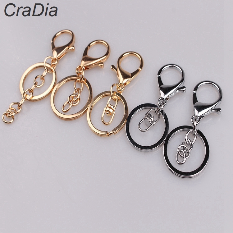 

100pcs set 30mm 12designs Key Chains Key Rings Round golden silver color Lobster Clasp Keychain T200804