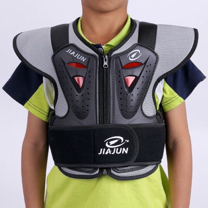 

Children's motorcycle and bicycle riders are equipped with cross-country guard and racing chest protector gear, Red