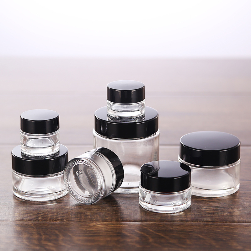 

12x 5g 10g 15g 20g 30g 50g 100g Travel Mini cream glass jar clear glass container with gold black silver cap Cosmetic Packaging