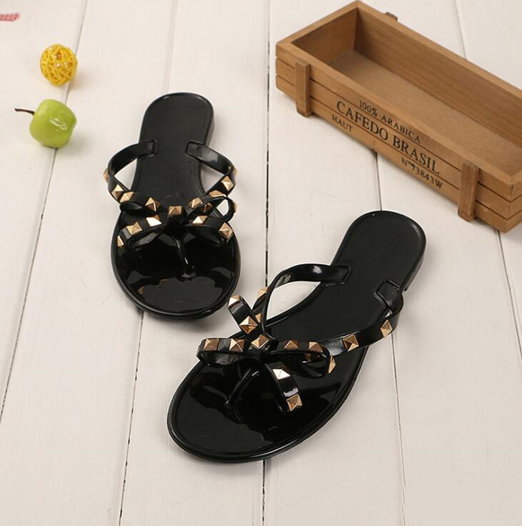 

Sexy Black Flat Woman Summer Sandals Rivets Big Bowknot Flip Flops Beach Sandalias Femininas Flat Jelly Designer Sandals