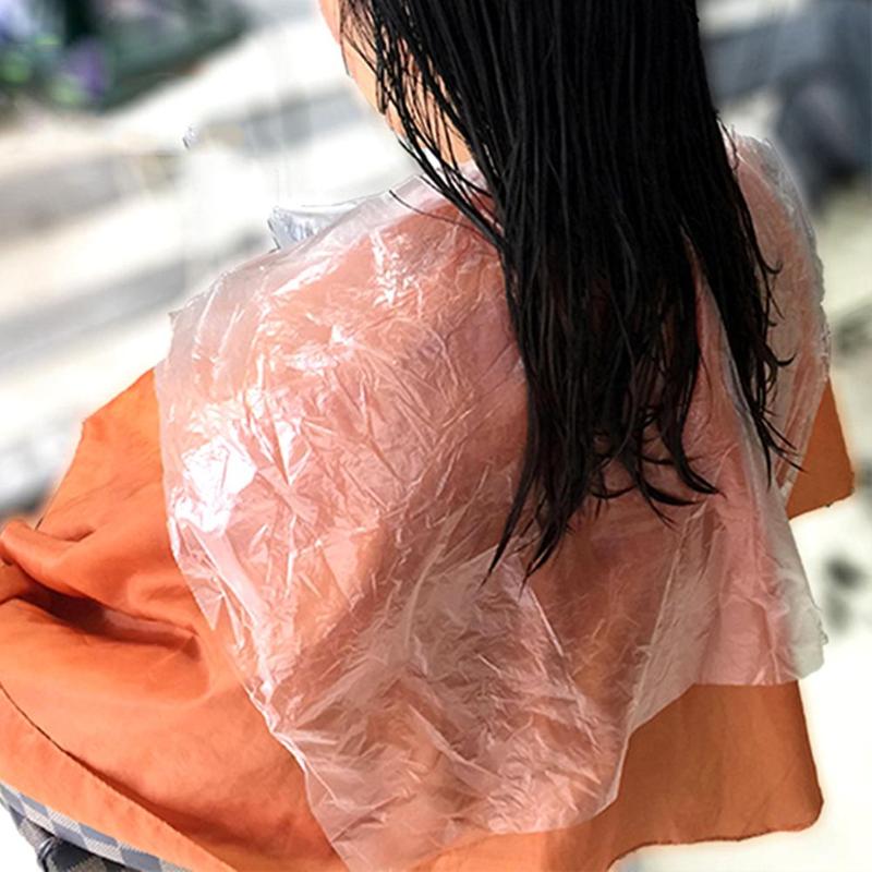 

200Pcs Disposable PE Waterproof Apron Cut Perm Dye Hair Cape Gown Antistatic HomeWrap Hairdressing Cloth