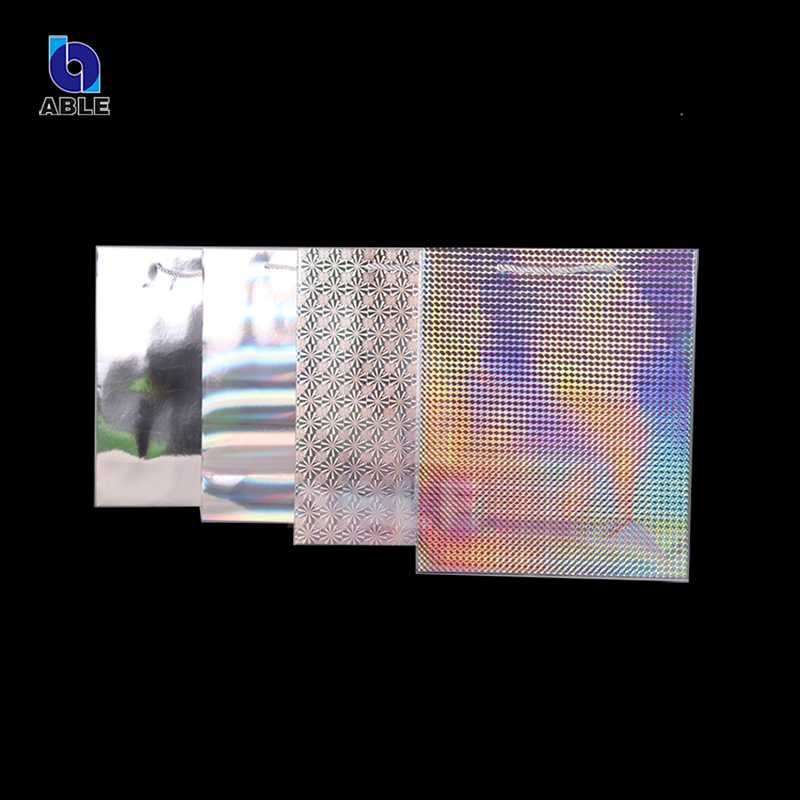 

Holographic gift bag 210gsm gift paper bags Luxury shopping package glitter paper bag 10pcs/lot for 2 size